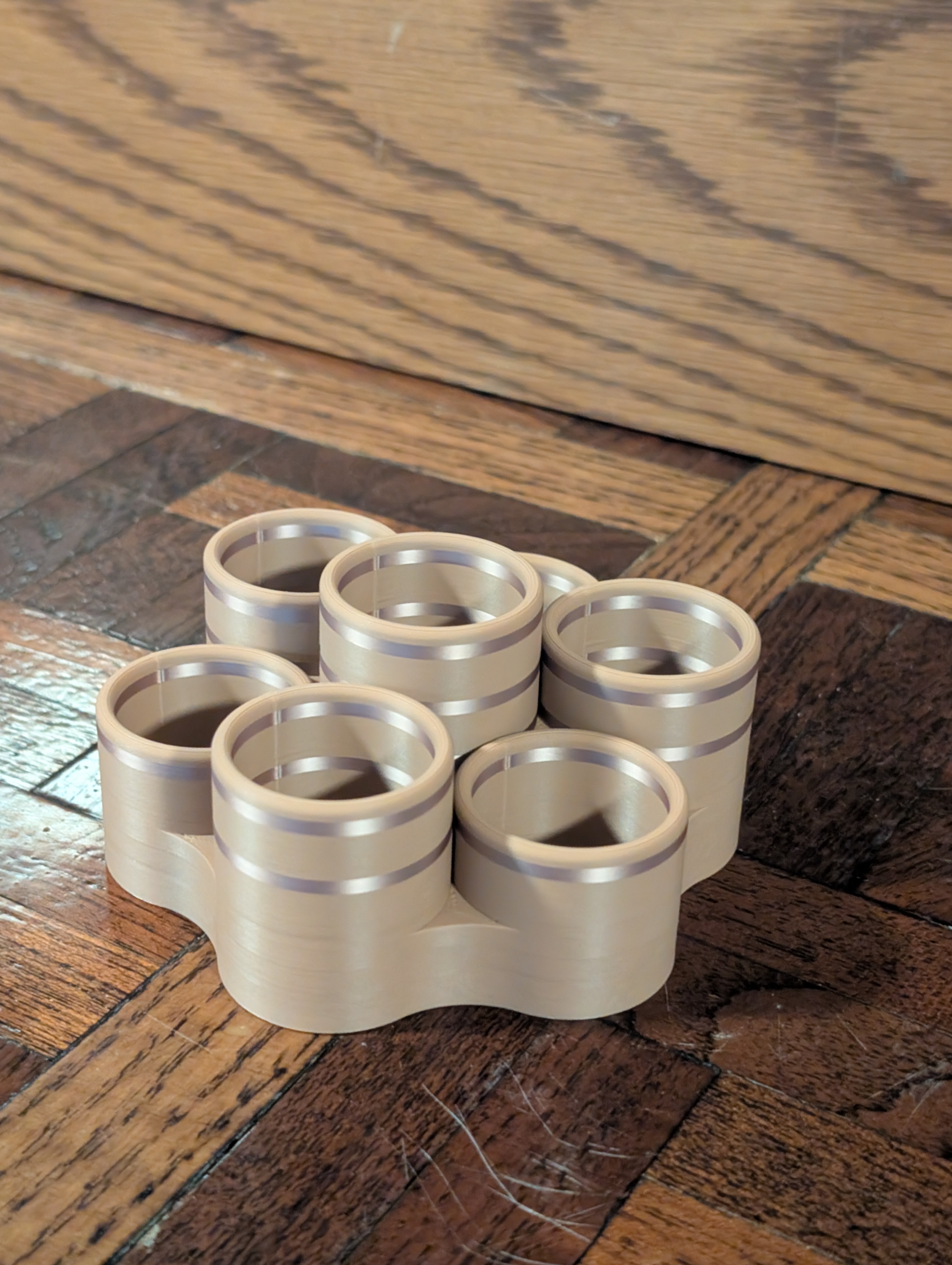 Close-up of tan Table 7 essential oil rack
